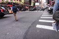 People walking around Times Square buildings in New York City, twillight Royalty Free Stock Photo