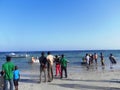 People walking at the beach at the Indian Ocean Mombasa Royalty Free Stock Photo