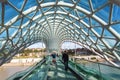 People walking on the Bridge of Peace, contemporary design landmark of Tbilisi