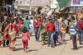 People walking in a busy road in the street market in holy city Pushkar, Rajasthan, India Royalty Free Stock Photo