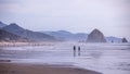 People walking on Cannon Beach, Oregon Coast