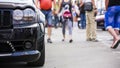 People Walking At Car Exhibition