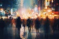 People walking in the city at night, motion blur, urban scene, A crowd of people walks in the city at night, creating a blurred Royalty Free Stock Photo