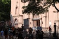 People on city street outside church in New York City USA