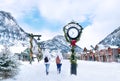 People walking in Colorado mountain town on winter break. Royalty Free Stock Photo