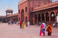 People walking in a courtyard of Jama Masjid, Delhi, India Royalty Free Stock Photo