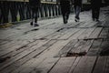 People walking on the destroyed wooden brige Royalty Free Stock Photo