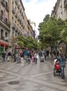 People walking down a shopping street Royalty Free Stock Photo