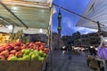 People walking in the downtown Amman market. Grand Husseini Mosque on foreground