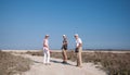 People walking at dried salt lake