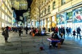 People walking on evening street illuminated with Christmas lights in Vienna, Austria Royalty Free Stock Photo
