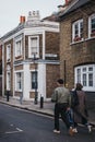 People walking on Ezra street in Tower Hamlets, London, UK, motion blur