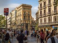 people walking in famous pedestrian area La Rambla