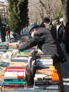 People walking and flipping through books Antique Book Store in Royalty Free Stock Photo