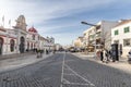 People walking in front of the city`s municipal market  of Loule, Portugal Royalty Free Stock Photo