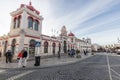 People walking in front of the city`s municipal market  of Loule, Portugal Royalty Free Stock Photo