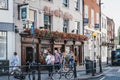 People walking in front of The Old Ship pub in Richmond, London, UK. Royalty Free Stock Photo