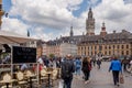 People walking in the Grand Place in Lille, France. Royalty Free Stock Photo