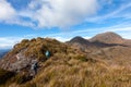 People walking with great backpacks in mountain landscape - trekking hiking mountaneering in mantiqueira range Brazil Royalty Free Stock Photo