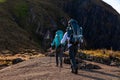People walking with great backpacks in mountain landscape - trekking hiking mountaneering in mantiqueira range Brazil Royalty Free Stock Photo