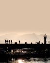 people walking in harbor over clear sky Royalty Free Stock Photo