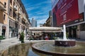 People walking and having lunch on Corso Como complying with the social distancing requirements