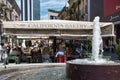 People walking and having lunch on Corso Como complying with the social distancing requirements