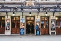 People walking by Her Majesty Theatre in West End of London, UK