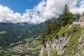 People at hiking trail through Austrian mountains to ice cave Royalty Free Stock Photo