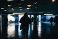 People walking inside underground tunnel Royalty Free Stock Photo