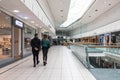 People walking through Interior of Buchanan Galleries shopping centre mall