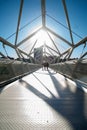 People walking through the iron bridge Royalty Free Stock Photo