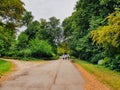 People walking in the JARDIN DU GRAND ROND n a beautiful public park in the city of Toulouse, France