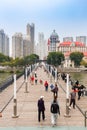 People walking the Jintang bridge over the river Haihe in Tianjin