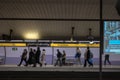 people walking leaving the platform of the Urquinaona metro stop in Barcelona