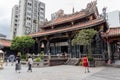 People walking at Lungshan Temple main gate, Taipei City, Taiwan, Aug 20, 2019