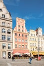 People walking on Main Market Square in Wroclaw