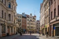 People walking on the main pedestrian street in Torun Old town