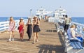 People walking on the Malibu Pier. Royalty Free Stock Photo