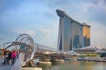 People walking by Marina Bay