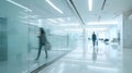 People Walking in a Modern Aquamarine Office Building Lobby Royalty Free Stock Photo