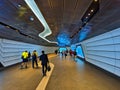 People Walking in Modern Barangaroo to Wynyard Pedestrian Tunnel, Sydney, Australia