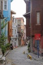 People are walking by the narrow street in Istanbul, Turkey