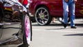 People Walking Near Car At Exhibition