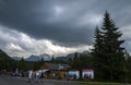 People walking near Gift shops at the tourist resort Strbske Pleso, High Tatras, Slovakia