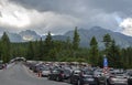 People walking near gift shops at the tourist resort Strbske Pleso. High Tatras, Slovakia