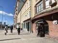 Moscow, Russia, March, 15, 2022. People walking near Khinkalnaya in house 28 on Krasnaya Presnya Street