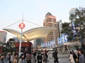 People walking near Ping Finance Building in front of Oriental Pearl Tower, Lujiazui, Pudong, Shanghai, China