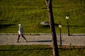 People walking in Nicolae Romanescu Park, Craiova, Romania