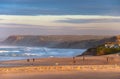 People walking ocean beach Portugal Royalty Free Stock Photo